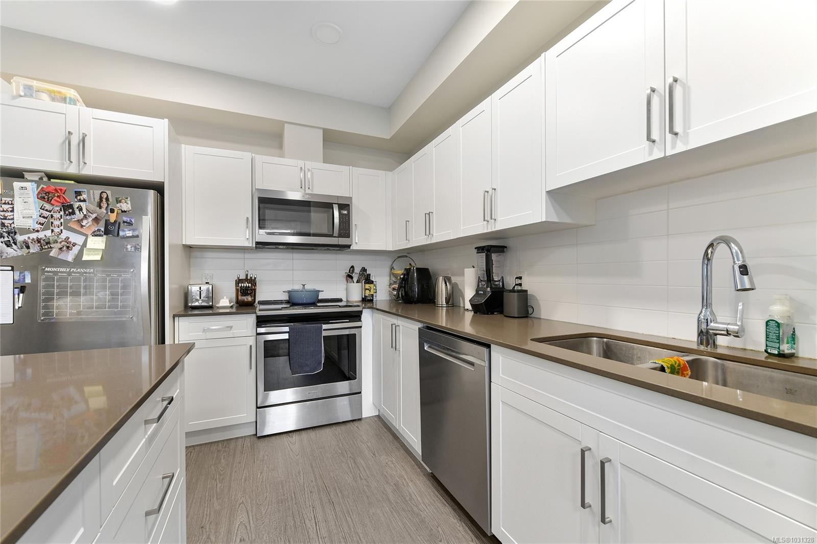 301-2843 Jacklin Rd, Langford, BC - Indoor Photo Showing Kitchen With Stainless Steel Kitchen With Double Sink With Upgraded Kitchen