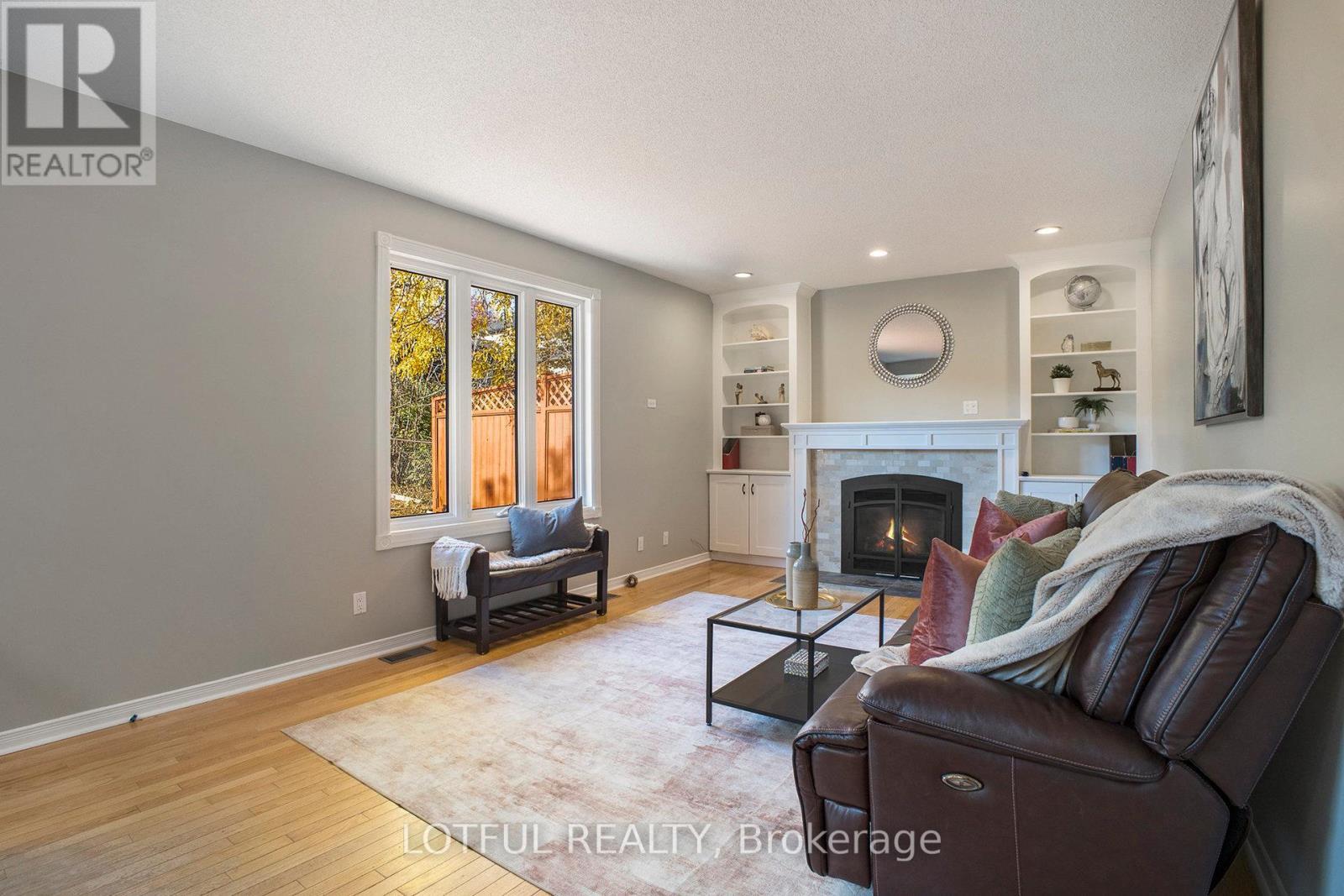 4 Spindle Way, Ottawa, ON - Indoor Photo Showing Living Room With Fireplace