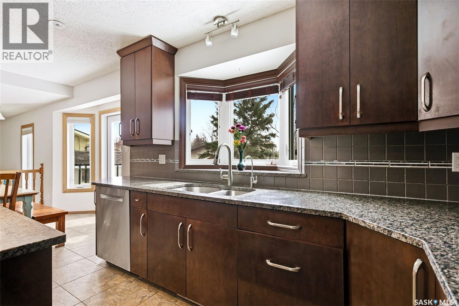 3242 Barton Place E, Regina, SK - Indoor Photo Showing Kitchen With Double Sink