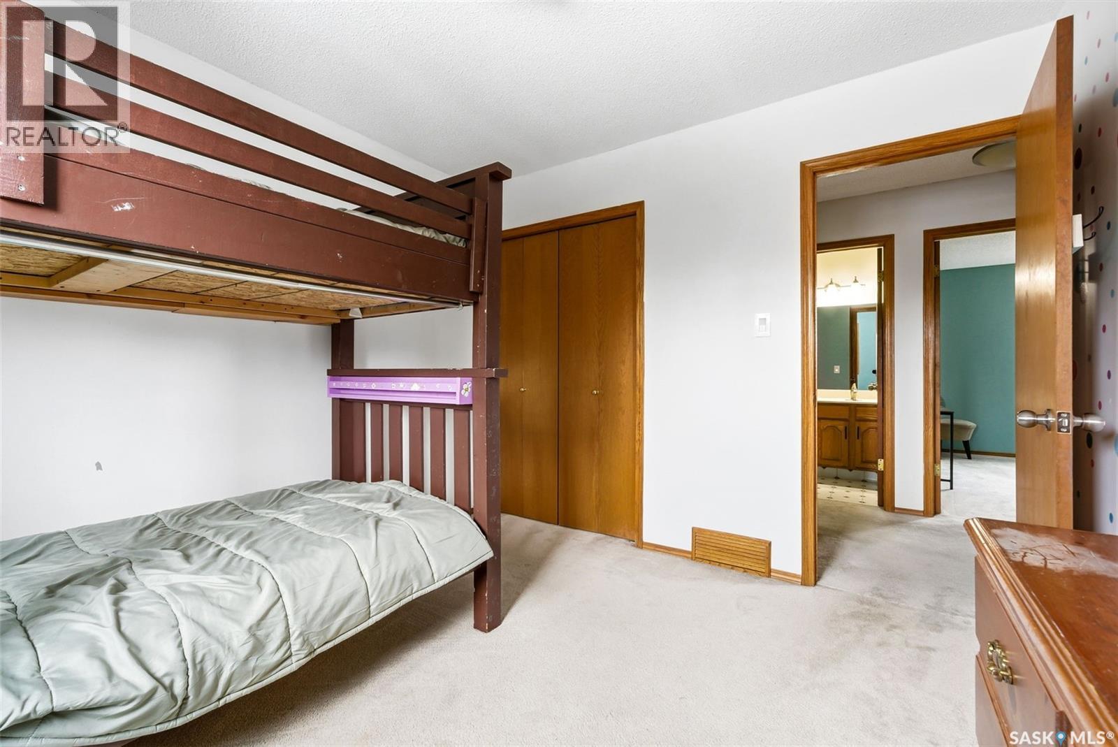 3242 Barton Place E, Regina, SK - Indoor Photo Showing Bedroom