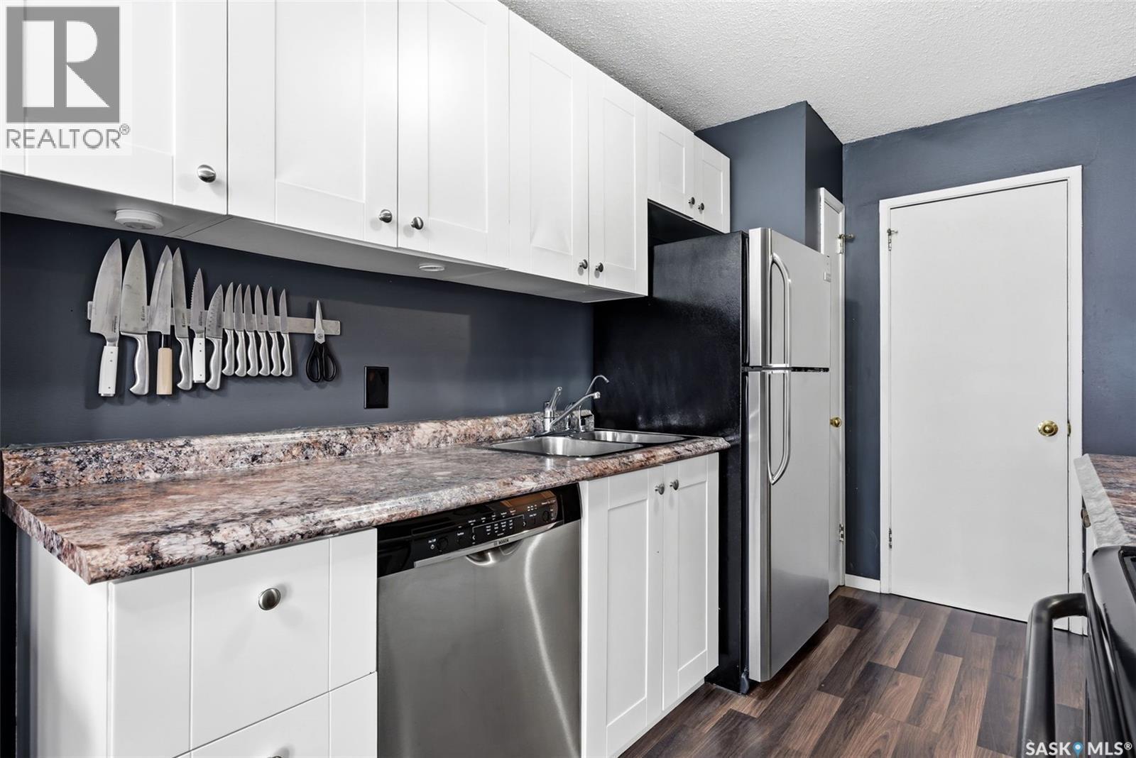 N 4212 Castle Road, Regina, SK - Indoor Photo Showing Kitchen With Double Sink