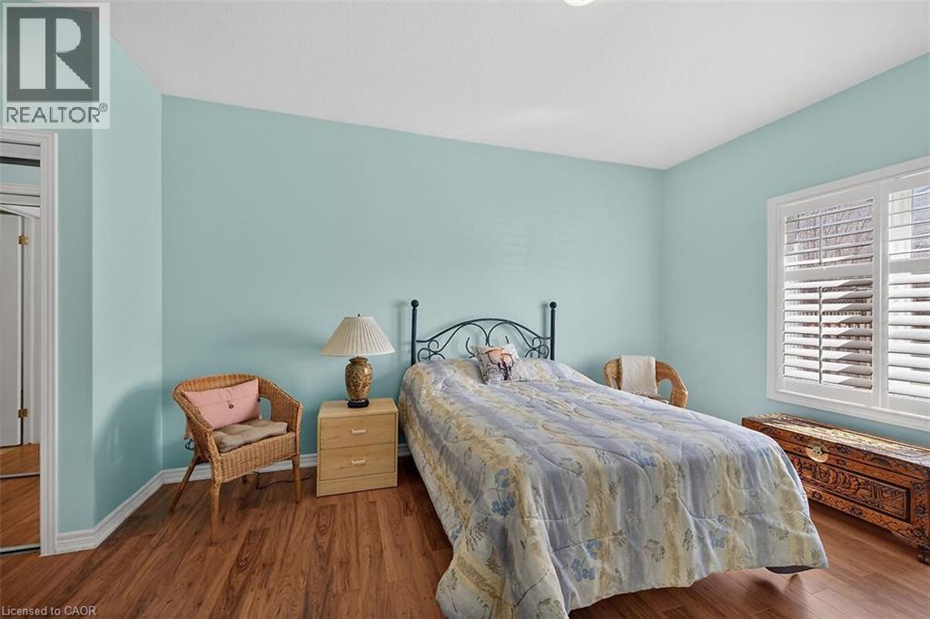 Bedroom with dark wood-style flooring - 48 Hallmark Trail, Hamilton, ON - Indoor Photo Showing Bedroom