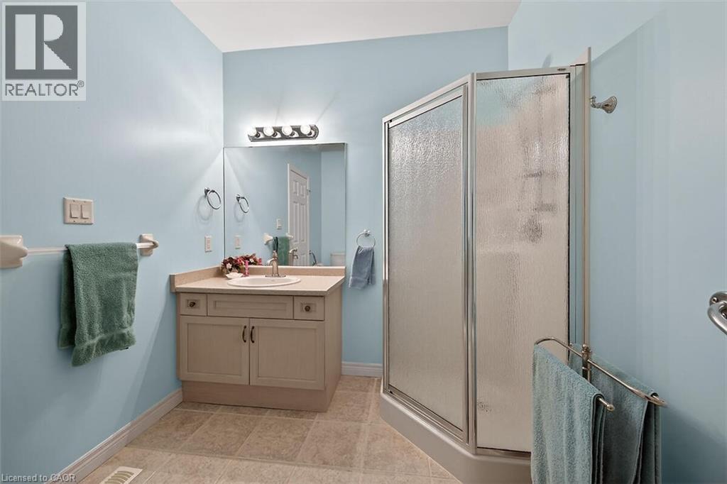 Bathroom featuring vanity and a stall shower - 48 Hallmark Trail, Hamilton, ON - Indoor Photo Showing Bathroom