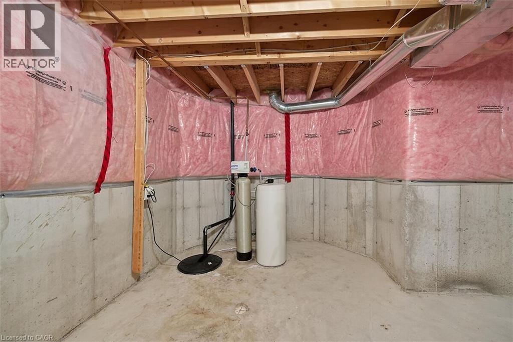 Unfinished below grade area with a water softener - 48 Hallmark Trail, Hamilton, ON - Indoor Photo Showing Basement