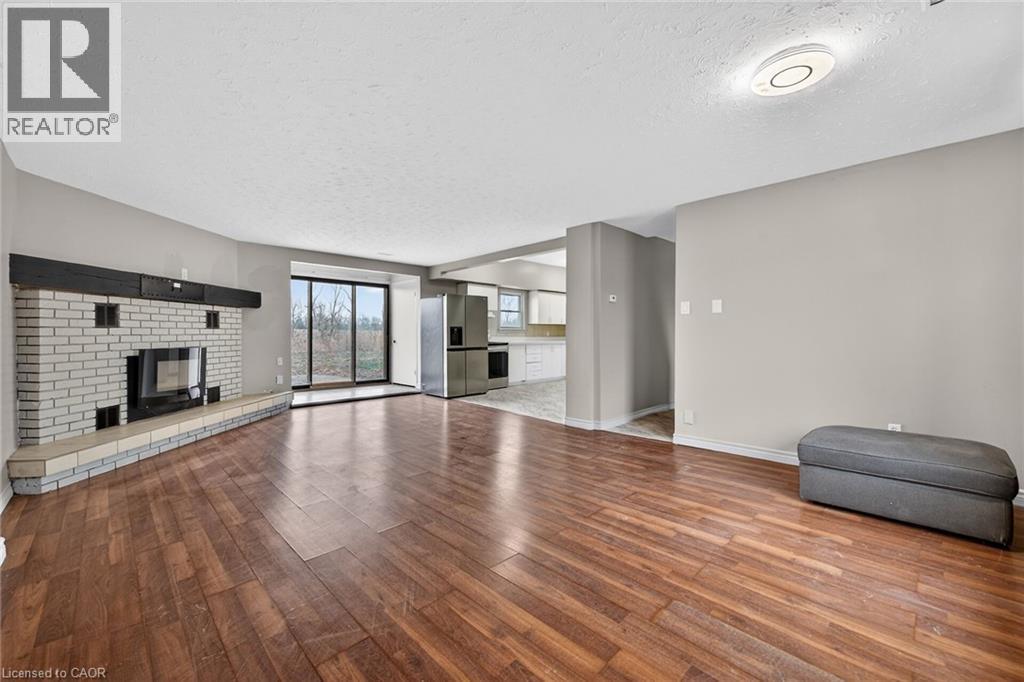 4049 Highway 6, Hamilton, ON - Indoor Photo Showing Other Room With Fireplace