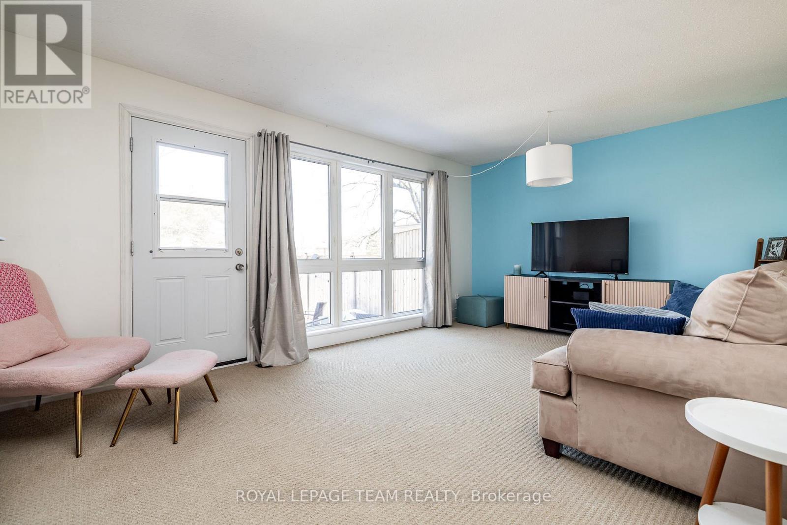 living room door to backyard - 28 - 28 Peary Way, Ottawa, ON - Indoor Photo Showing Living Room