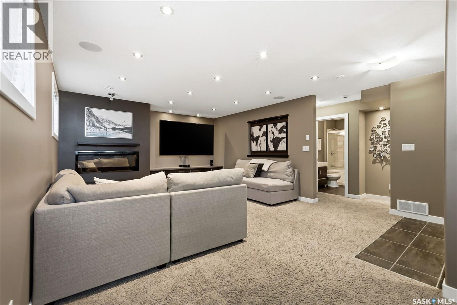 4127 Cumberland Road E, Regina, SK - Indoor With Fireplace