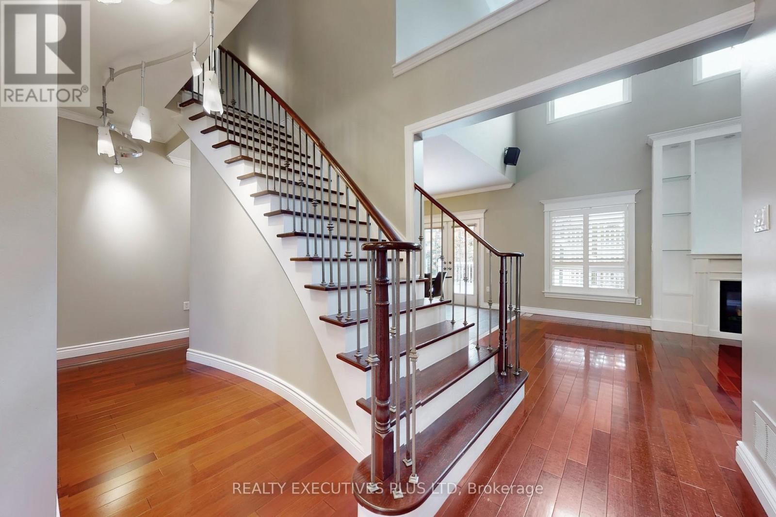 Hardwood Staircase w/ Wrought Iron Picketts - 46 Williamson Drive W, Ajax, ON - Indoor Photo Showing Other Room