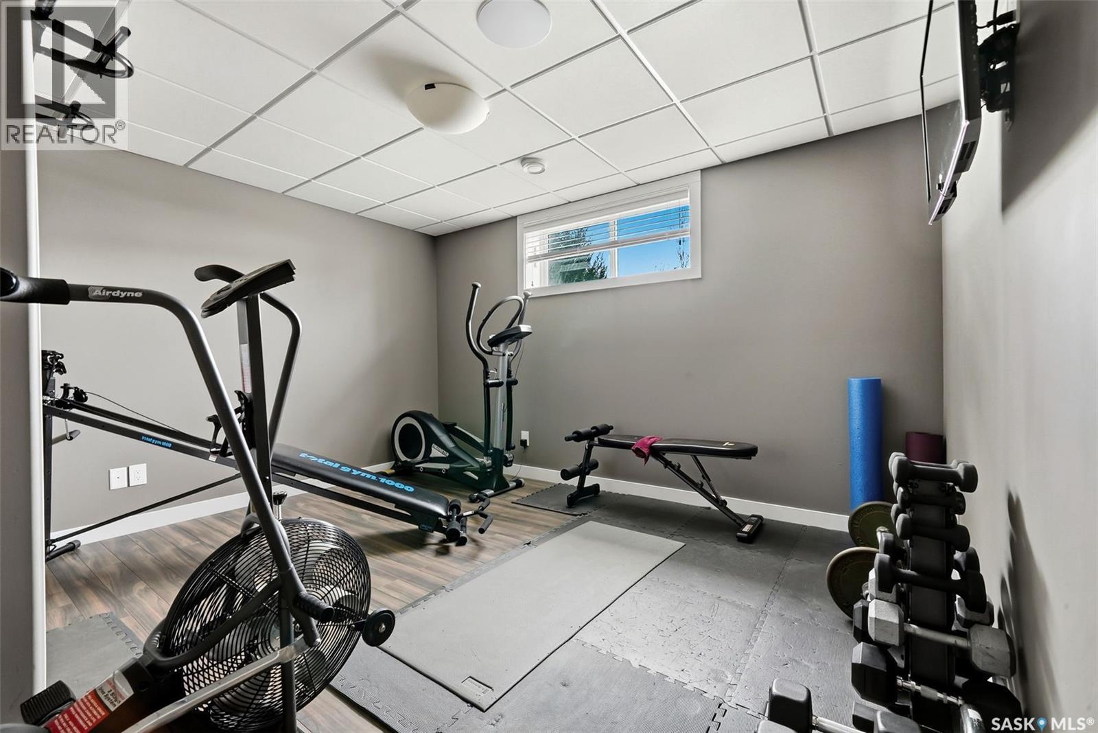 6040 Little Pine Loop, Regina, SK - Indoor Photo Showing Gym Room