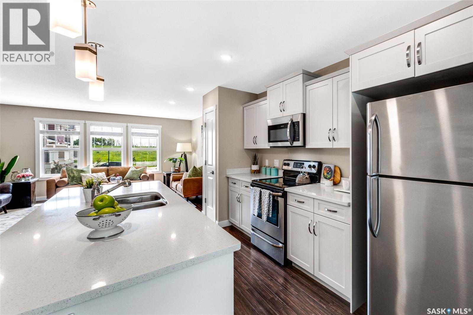 214 1220 Pringle Way, Saskatoon, SK - Indoor Photo Showing Kitchen With Double Sink With Upgraded Kitchen