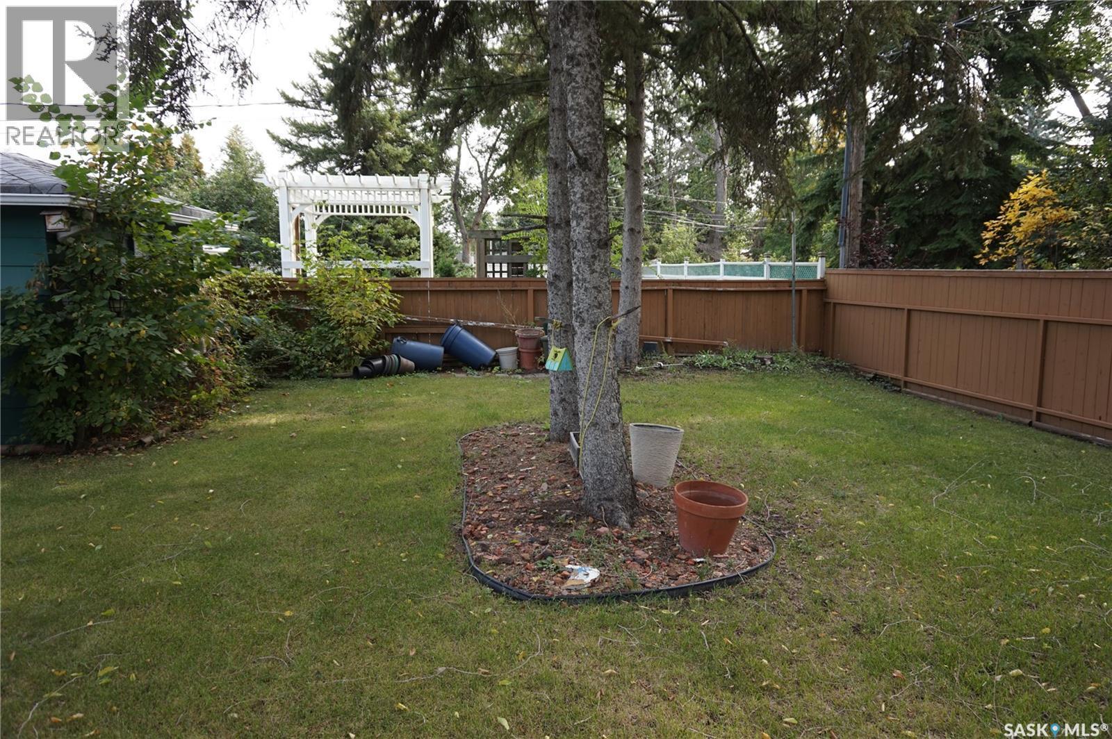 77 Millar Crescent, Regina, SK - Outdoor With Backyard