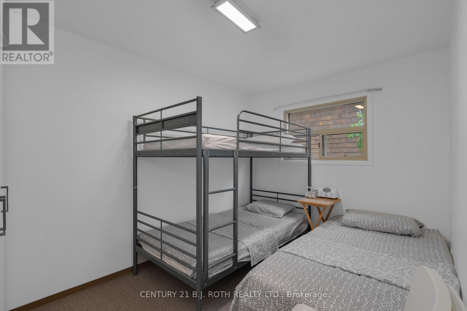 2026 Tiny Beaches Road S, Tiny, ON - Indoor Photo Showing Bedroom