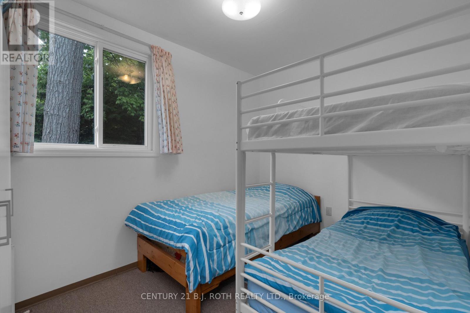 2026 Tiny Beaches Road S, Tiny, ON - Indoor Photo Showing Bedroom