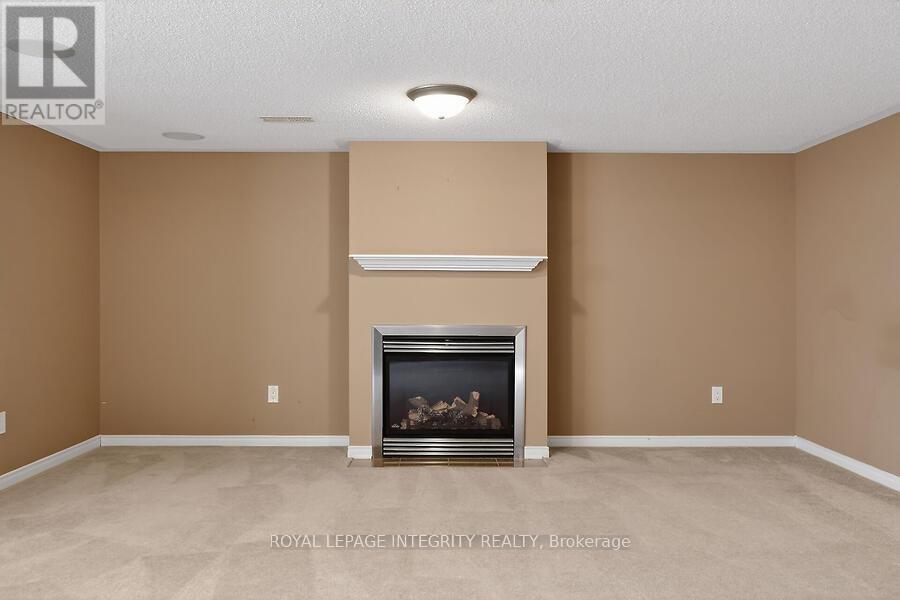 672 Pepperville Crescent E, Ottawa, ON - Indoor With Fireplace