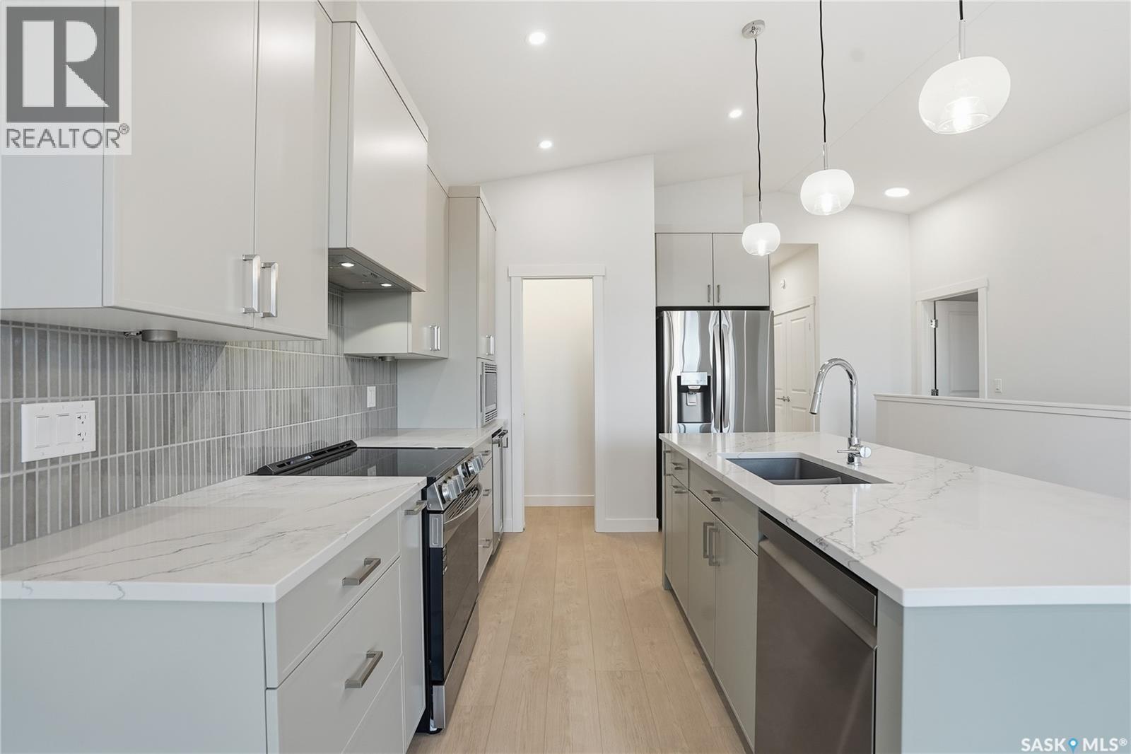 151 Nazarali Way, Saskatoon, SK - Indoor Photo Showing Kitchen With Upgraded Kitchen