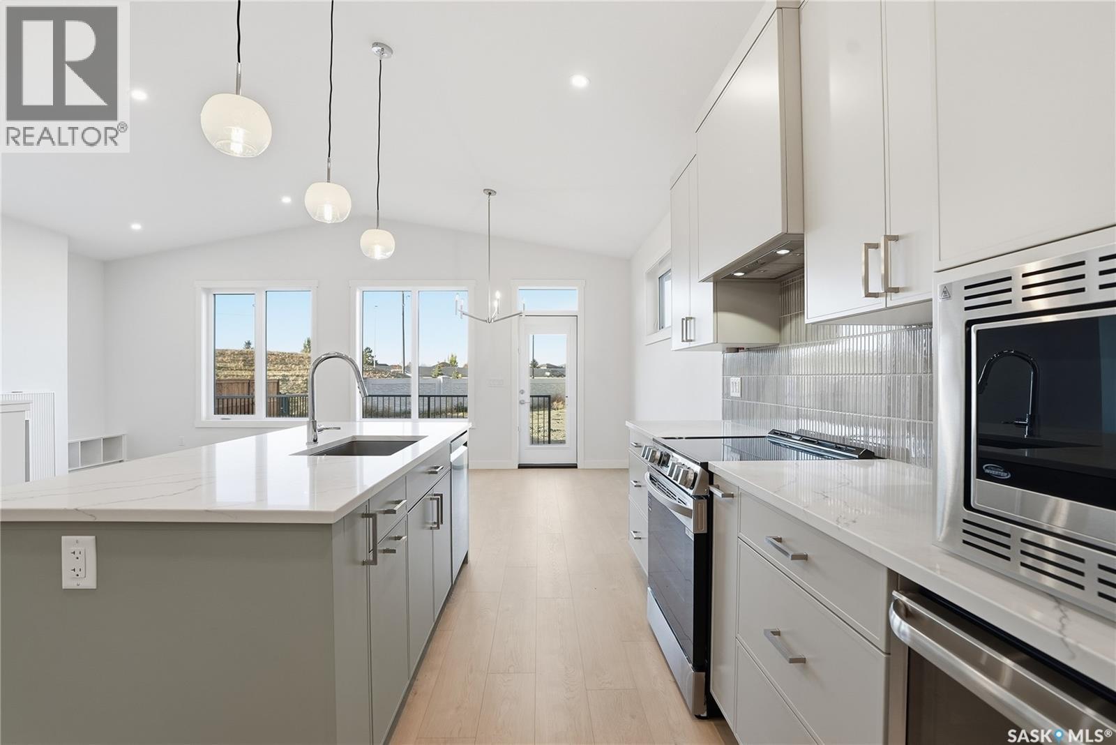 151 Nazarali Way, Saskatoon, SK - Indoor Photo Showing Kitchen With Upgraded Kitchen