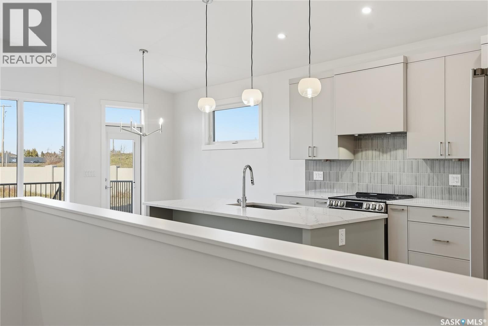 151 Nazarali Way, Saskatoon, SK - Indoor Photo Showing Kitchen With Upgraded Kitchen