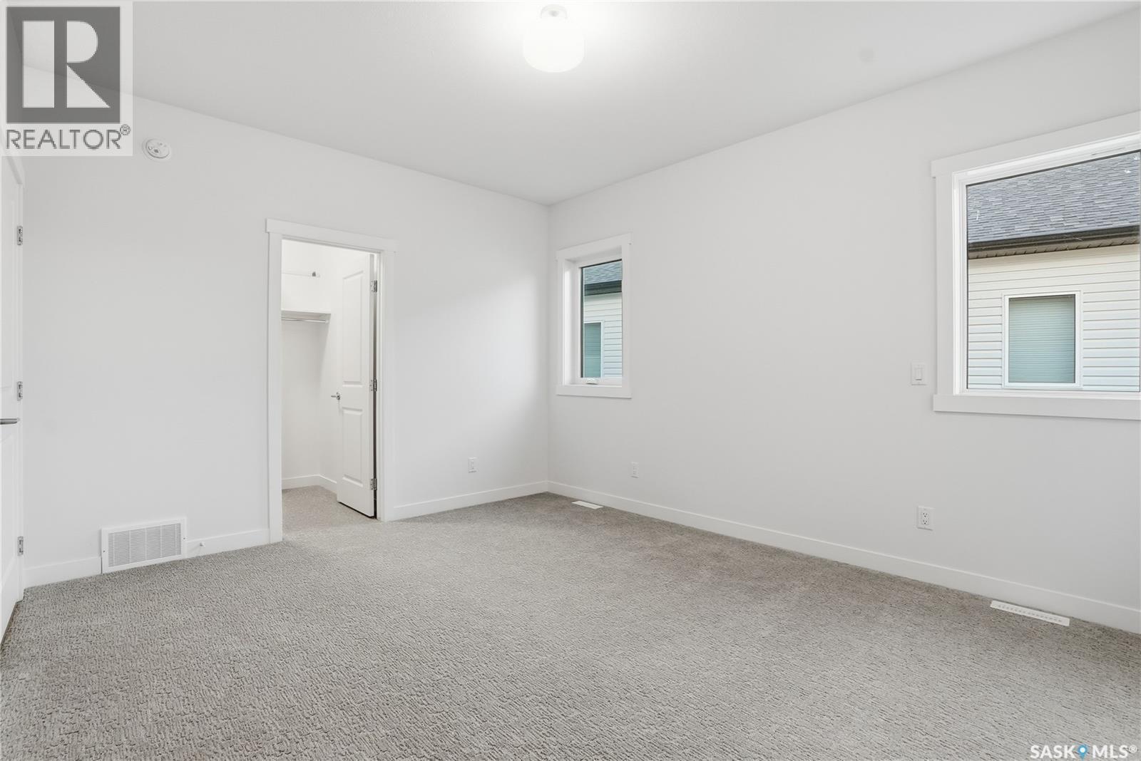 151 Nazarali Way, Saskatoon, SK - Indoor Photo Showing Other Room