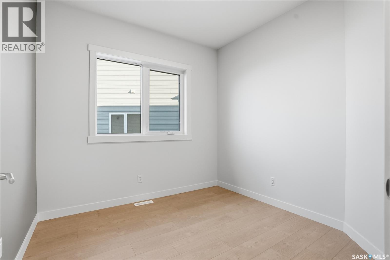 151 Nazarali Way, Saskatoon, SK - Indoor Photo Showing Other Room