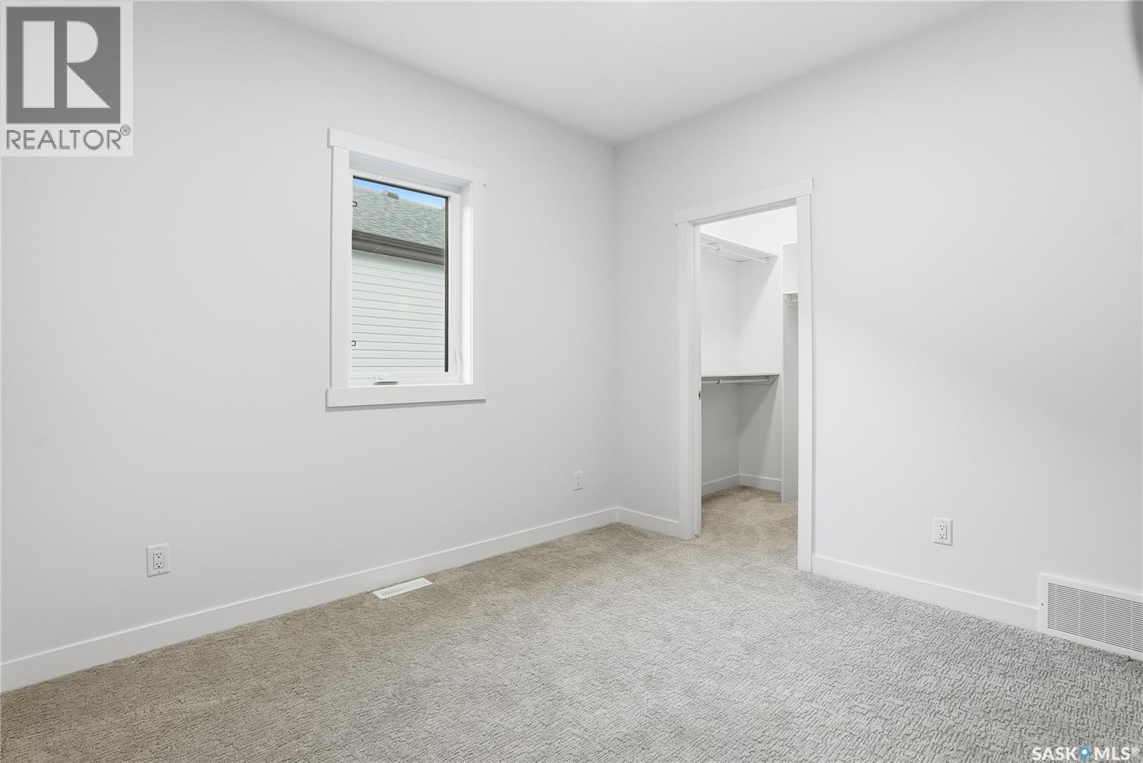 151 Nazarali Way, Saskatoon, SK - Indoor Photo Showing Other Room