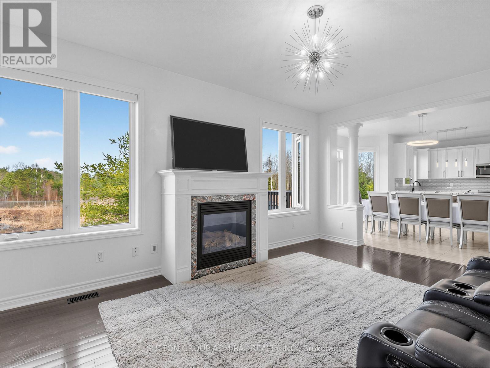 96 Mount Crescent, Essa, ON - Indoor Photo Showing Living Room With Fireplace
