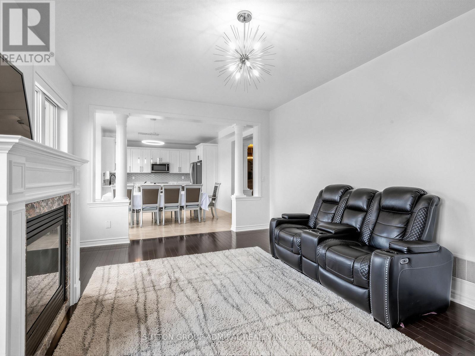96 Mount Crescent, Essa, ON - Indoor Photo Showing Living Room With Fireplace