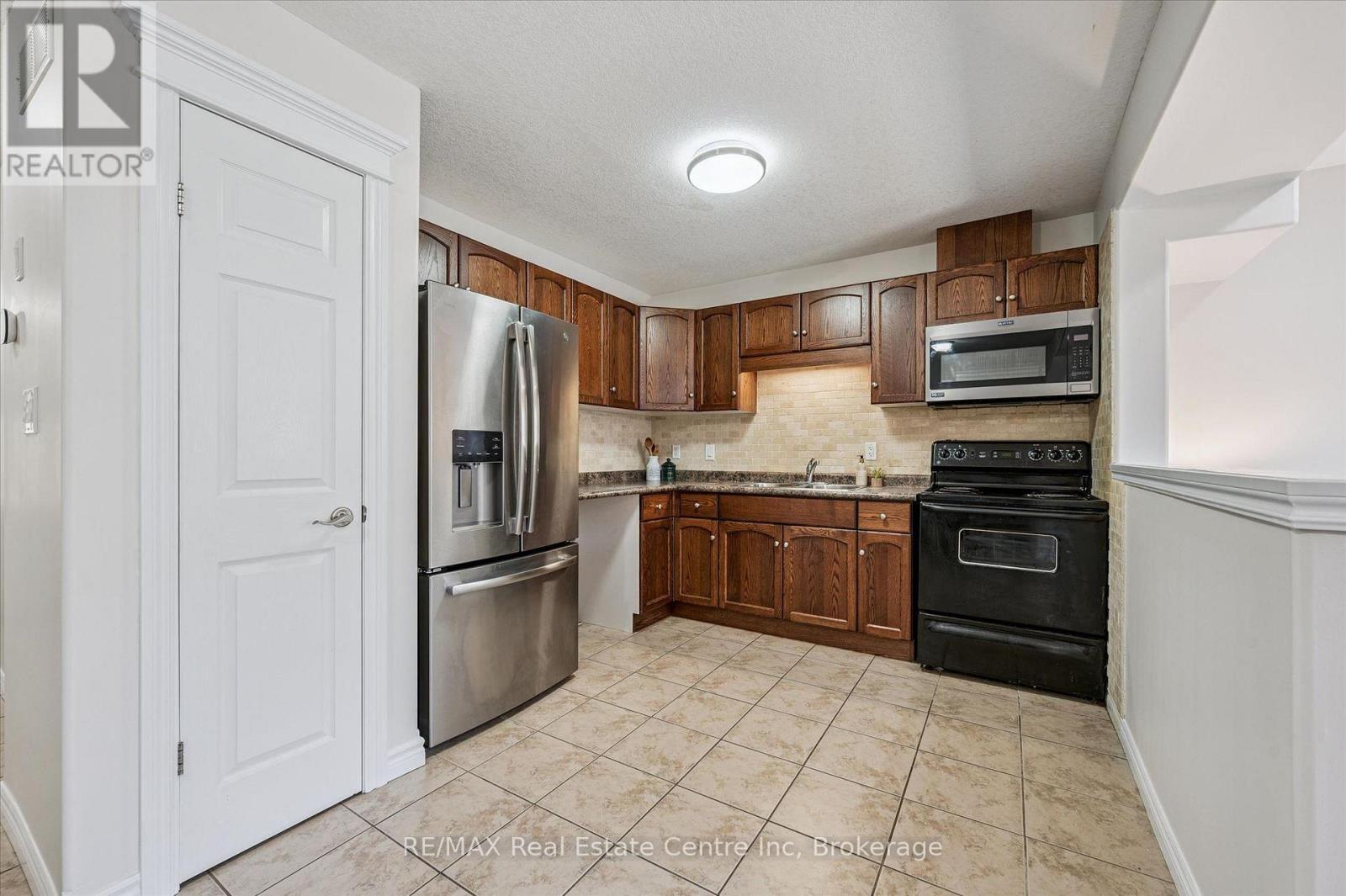 93 Washburn Drive, Guelph (Grange Road), ON - Indoor Photo Showing Kitchen