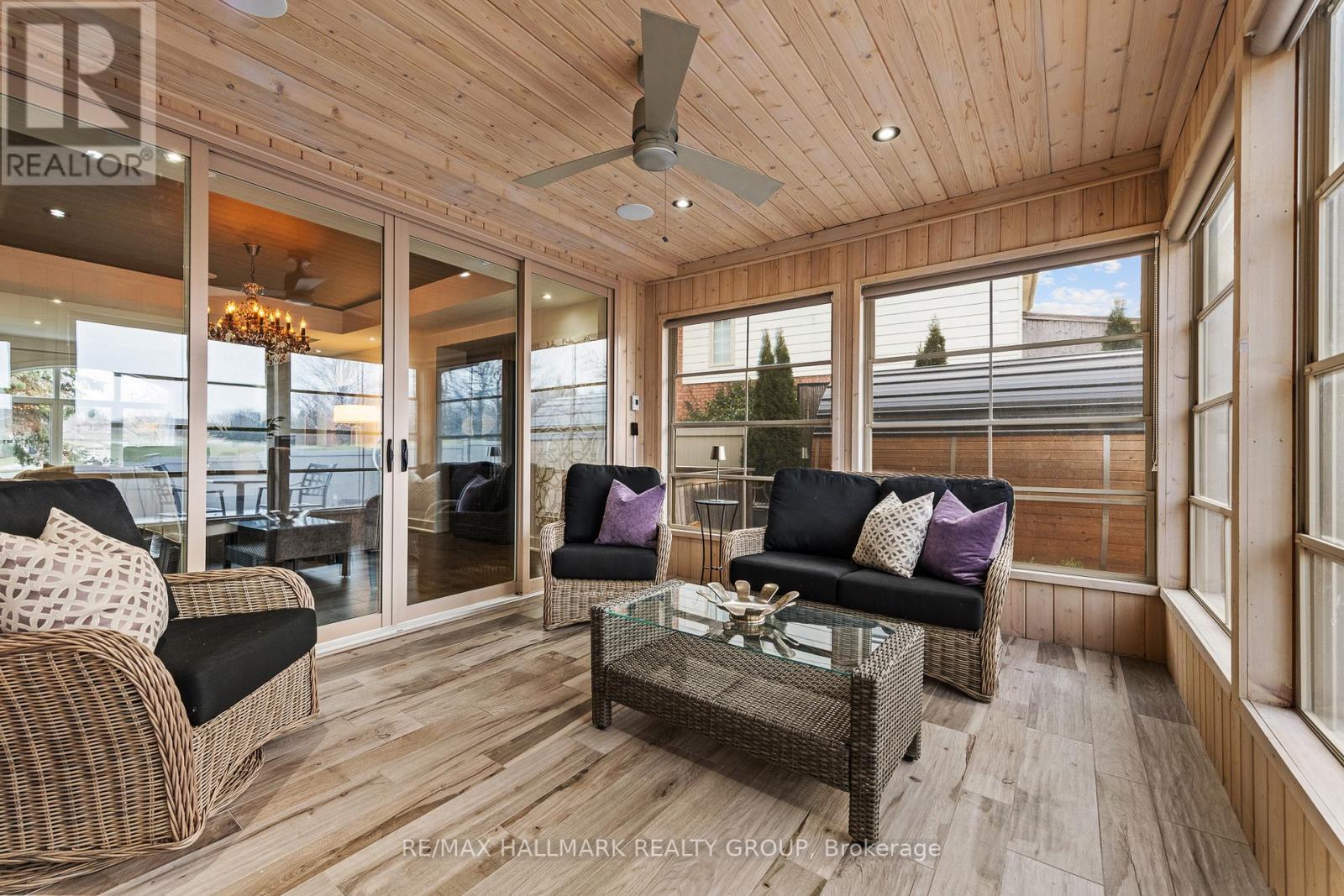 Screened porch with heated floor - 91 Shaughnessy Crescent, Ottawa, ON - Photo Showing Living Room