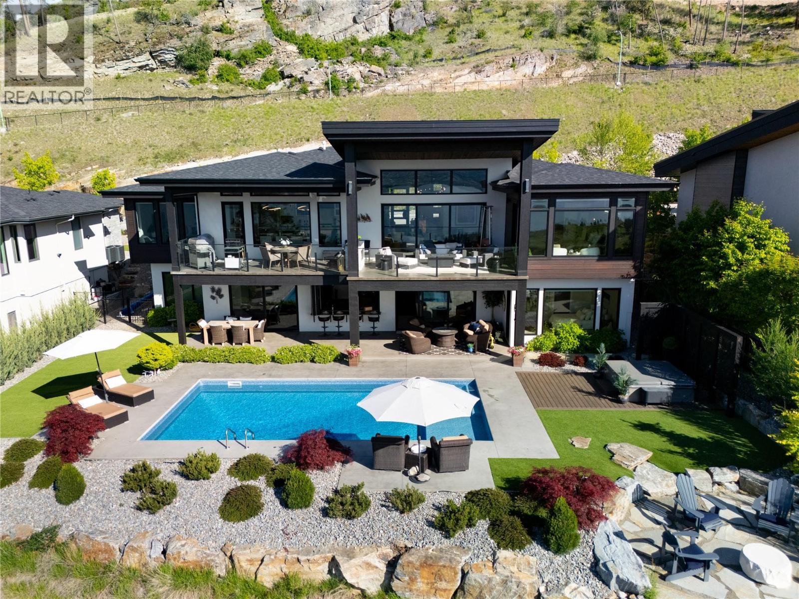 5650 The Edge Place Unit# 111, Kelowna, BC - Outdoor With In Ground Pool With Deck Patio Veranda