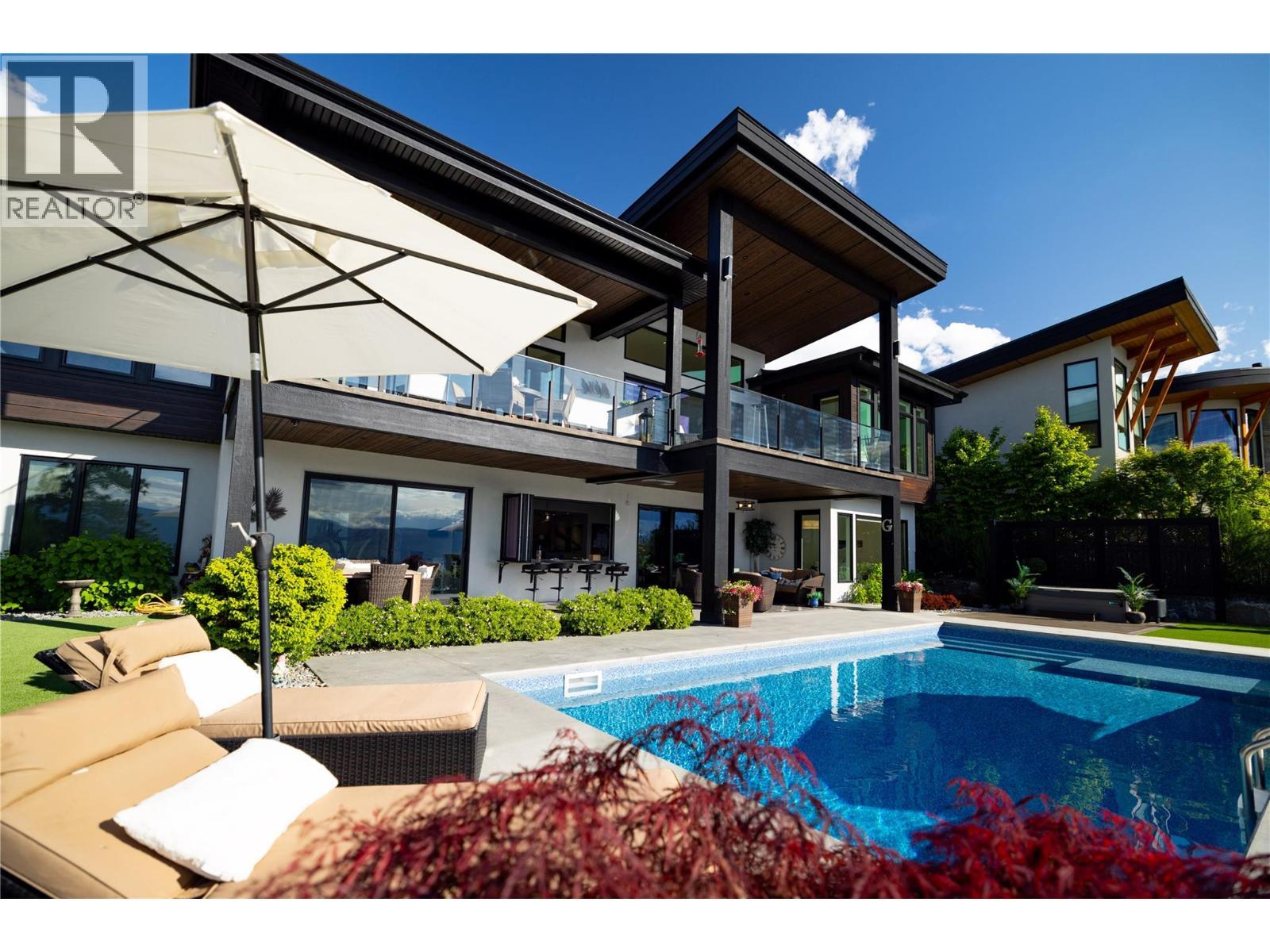 5650 The Edge Place Unit# 111, Kelowna, BC - Outdoor With In Ground Pool