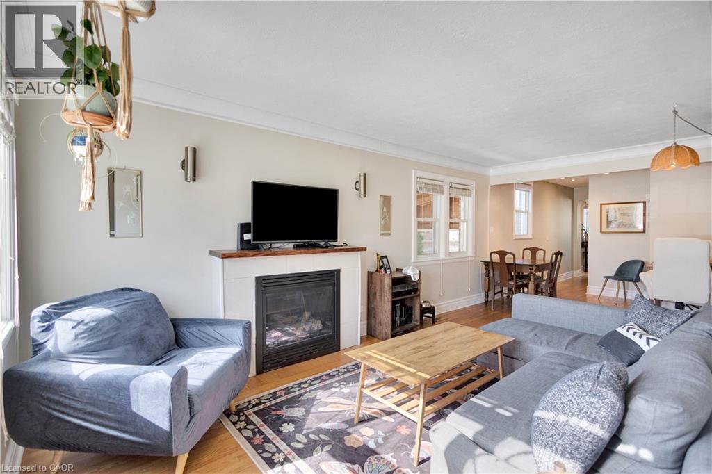 20 Barons Avenue S, Hamilton, ON - Indoor Photo Showing Living Room With Fireplace