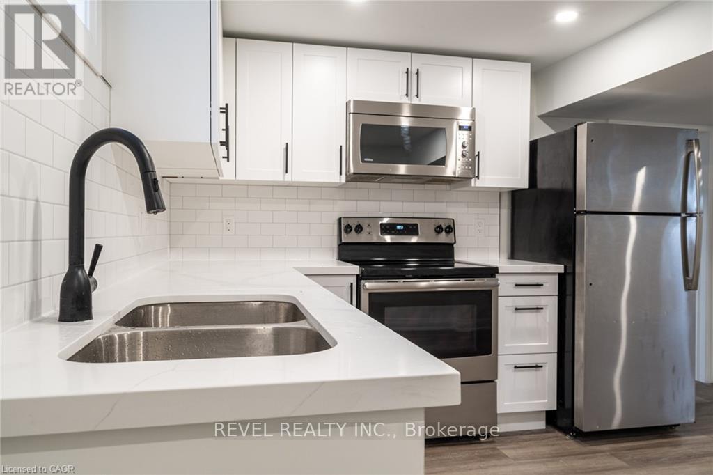 1141 Mohawk Road E, Hamilton, ON - Indoor Photo Showing Kitchen With Double Sink With Upgraded Kitchen