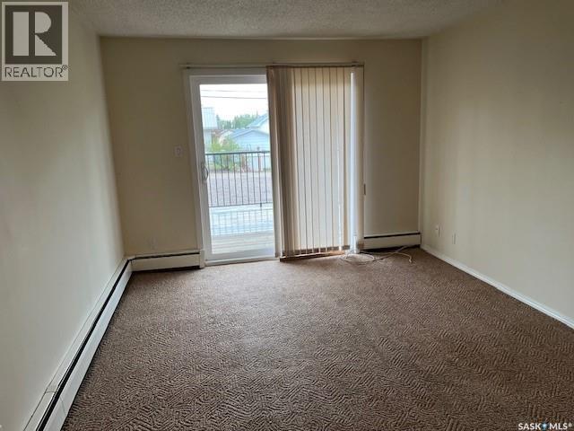 302 8Th Avenue Sw, Biggar, SK - Indoor Photo Showing Other Room