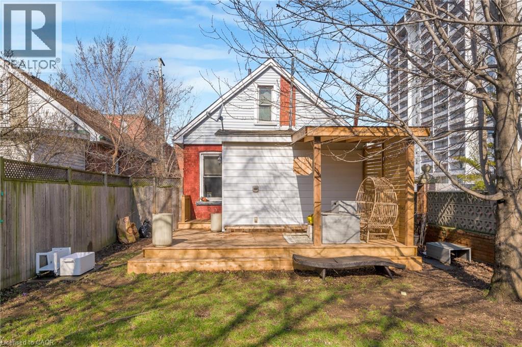 Rear view of property featuring a fenced backyard and a wooden deck - 6 Ben Lomond Place, Hamilton, ON - Outdoor With Deck Patio Veranda