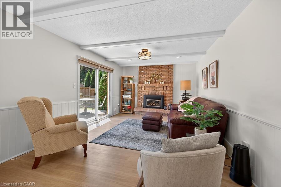 621 Tomahawk Crescent, Ancaster, ON - Indoor Photo Showing Living Room With Fireplace