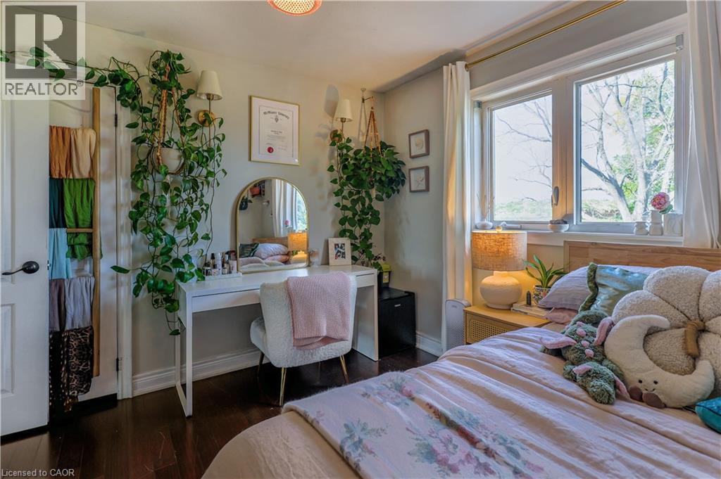 Bedroom with baseboards and dark wood-type flooring - 254 Rymal Road W, Hamilton, ON - Indoor Photo Showing Bedroom