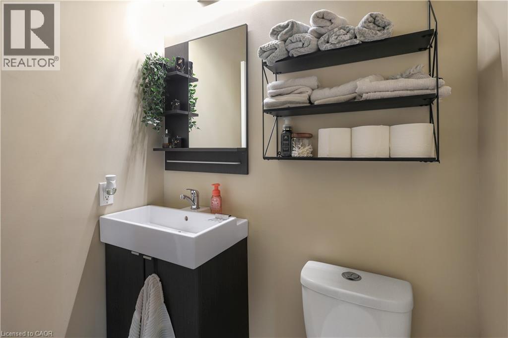 Bathroom featuring toilet and vanity - 254 Rymal Road W, Hamilton, ON - Indoor Photo Showing Bathroom