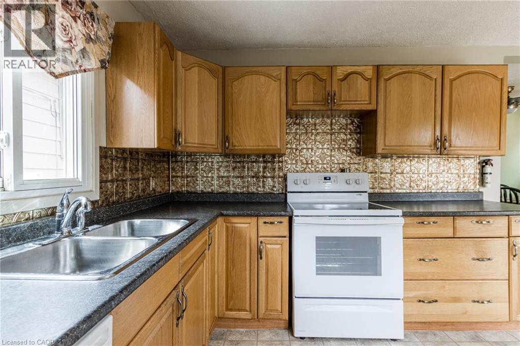 810 Tate Avenue, Hamilton, ON - Indoor Photo Showing Kitchen With Double Sink