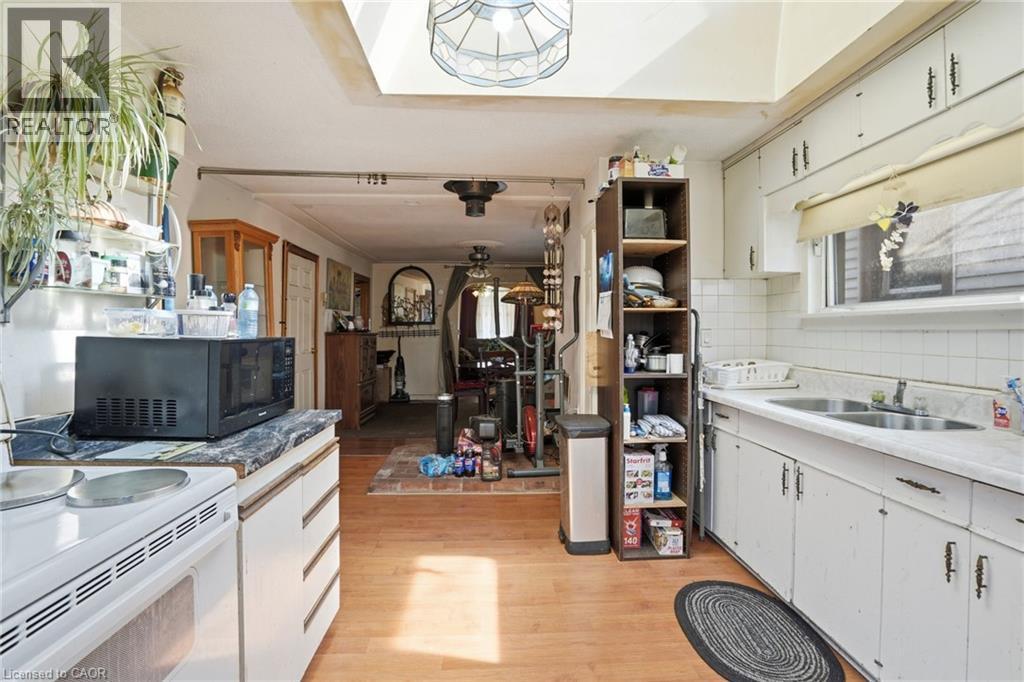 1382 Cannon Street E, Hamilton, ON - Indoor Photo Showing Kitchen With Double Sink