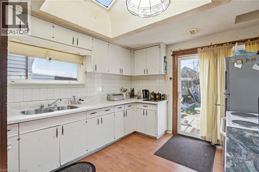 1382 Cannon Street E, Hamilton, ON - Indoor Photo Showing Kitchen With Double Sink