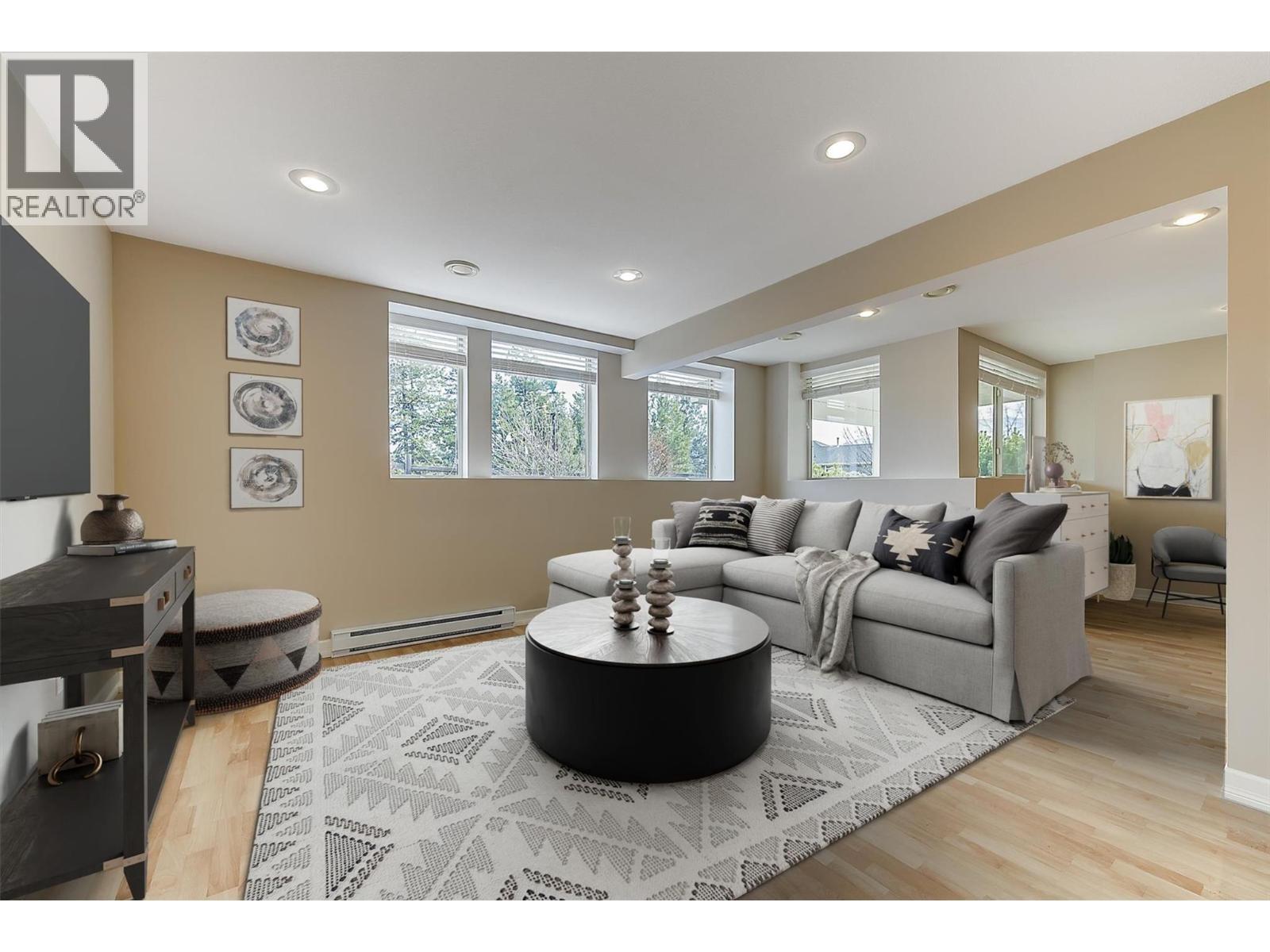 Downstairs Virtually Staged - 4035 Gellatly Road S Unit# 273, West Kelowna, BC - Indoor Photo Showing Living Room