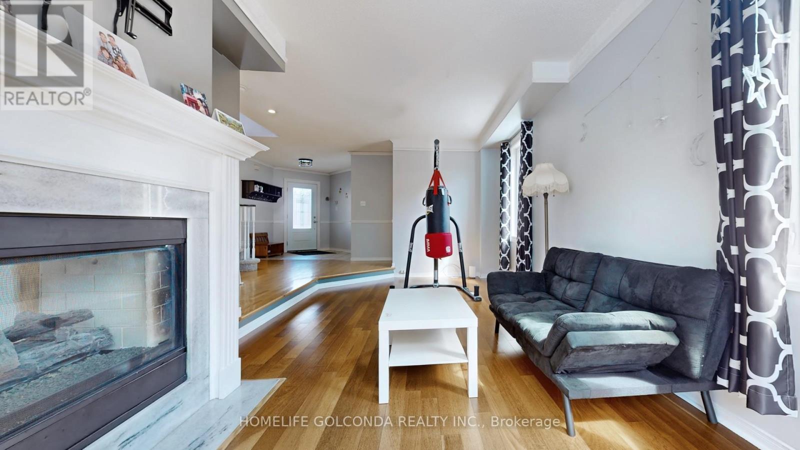 39 Etherington Crescent, Barrie, ON - Indoor Photo Showing Living Room With Fireplace