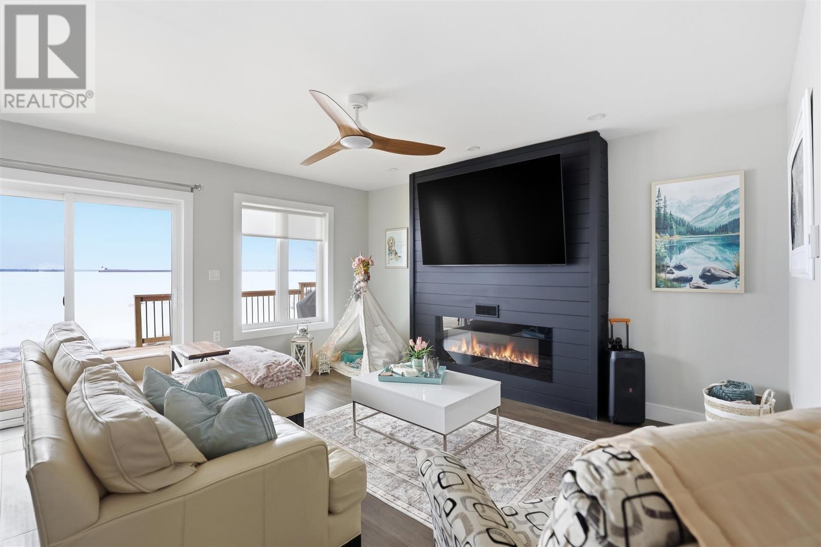 2875 Green St, Richards Landing, ON - Indoor Photo Showing Living Room With Fireplace