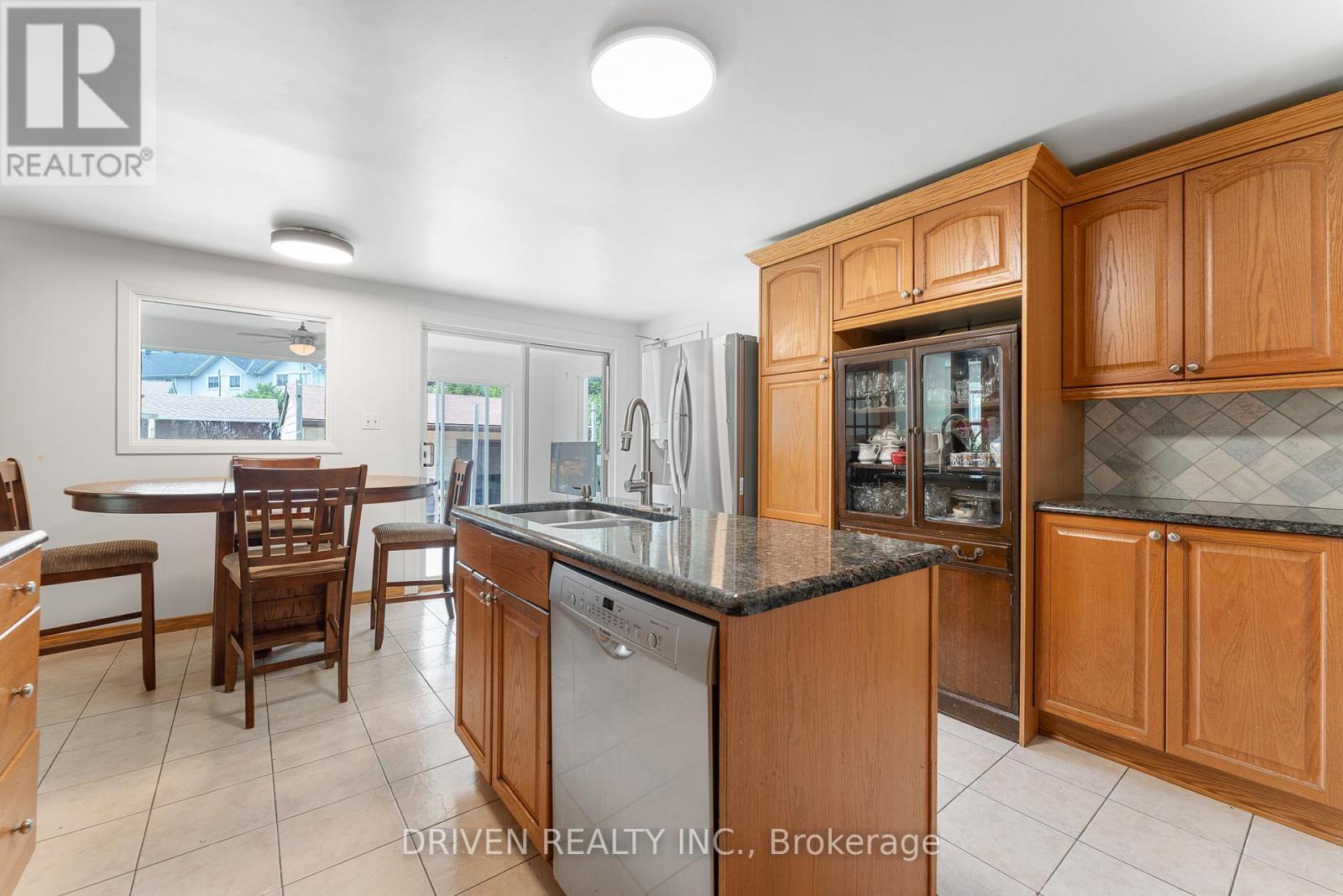 Bright kitchen with casual dining space. - 876 Pinecrest Road, Ottawa, ON - Indoor Photo Showing Kitchen