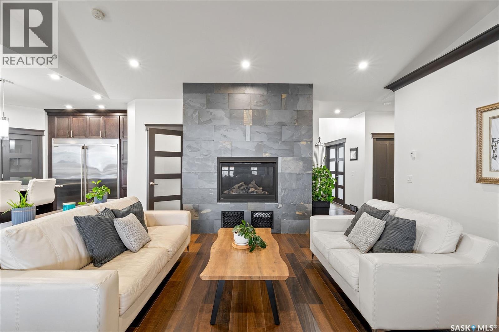 7 Pape Drive, Humboldt Lake, SK - Indoor Photo Showing Living Room With Fireplace