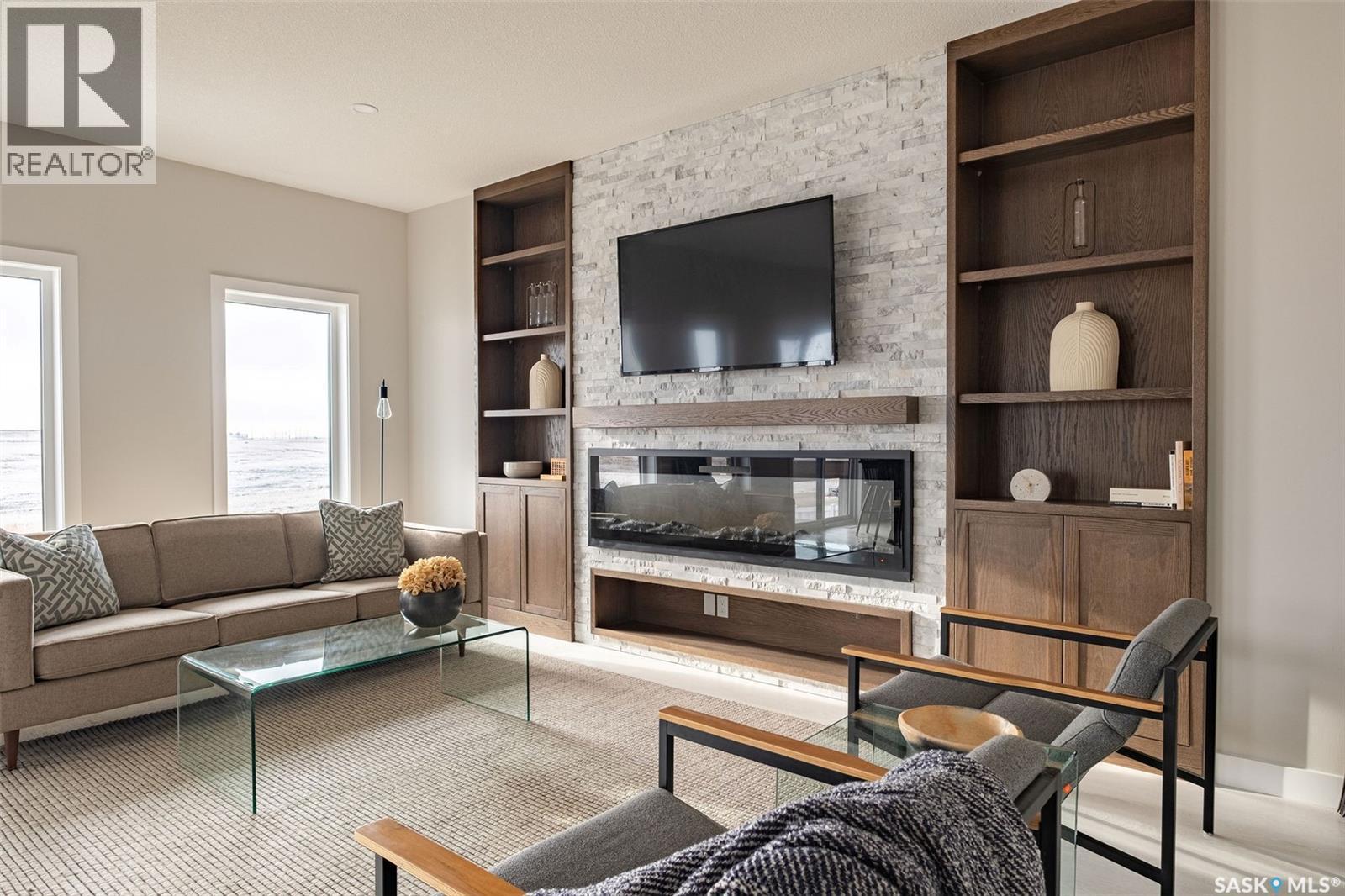 3748 Gee Crescent, Regina, SK - Indoor Photo Showing Living Room With Fireplace