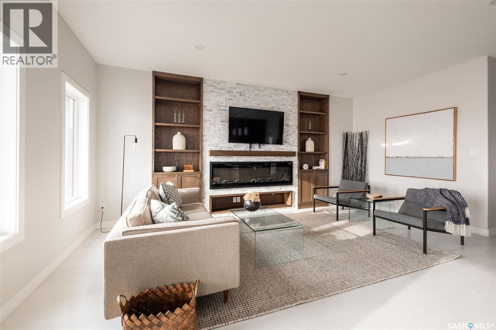 3748 Gee Crescent, Regina, SK - Indoor Photo Showing Living Room With Fireplace