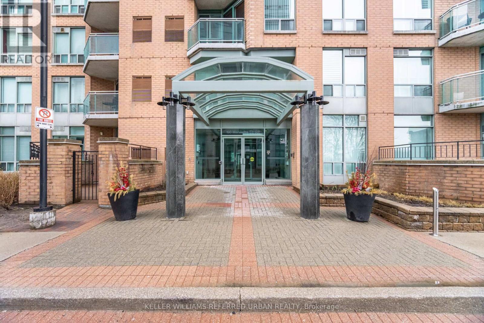 707 - 190 Manitoba Street, Toronto, ON - Outdoor With Balcony With Facade