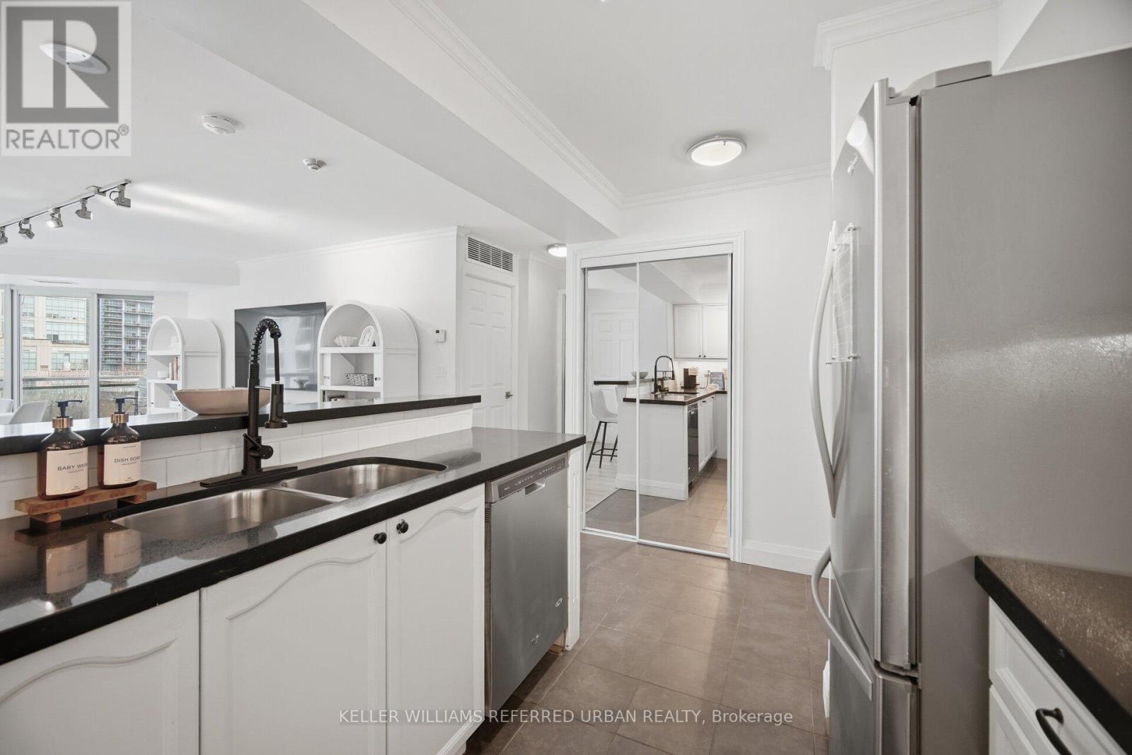707 - 190 Manitoba Street, Toronto, ON - Indoor Photo Showing Kitchen With Double Sink