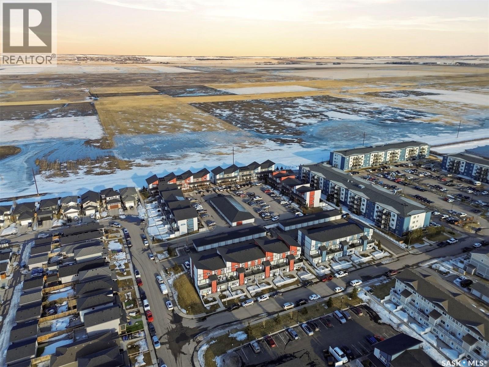 263 250 Akhtar Bend, Saskatoon, SK - Outdoor With Body Of Water With View